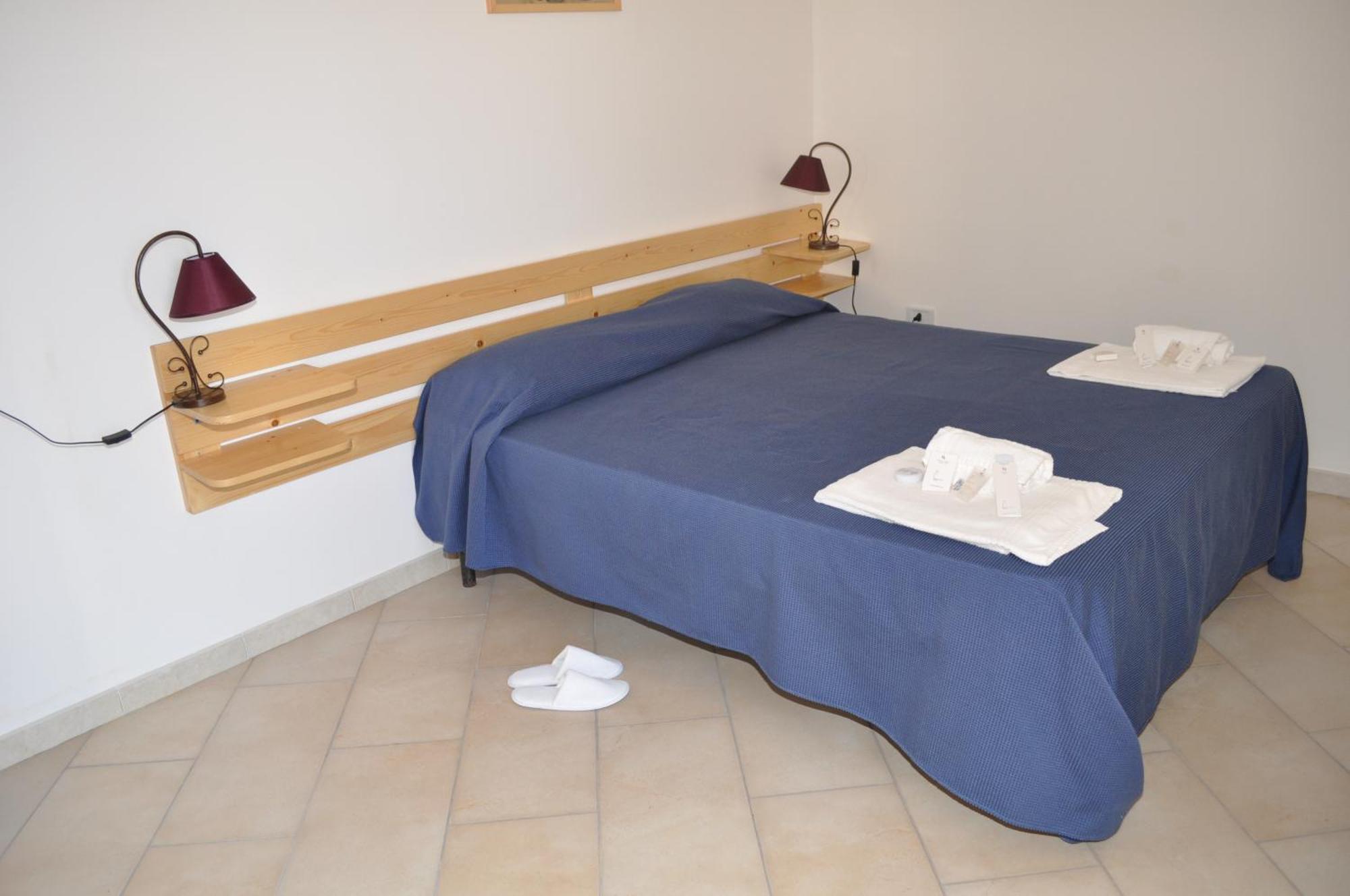 Case Albergo Al Cortiletto Ліката Екстер'єр фото