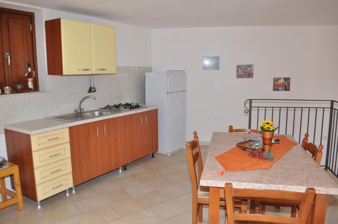 Case Albergo Al Cortiletto Ліката Номер фото